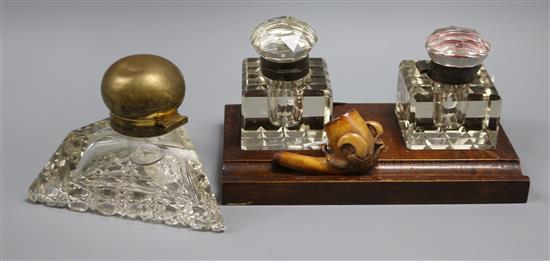 A Meerschaum pipe, a triangular cut glass inkwell and a desk stand fitted two cut glass inkwells A Meerschaum pipe, a triangular cut glass inkwell and a desk stand fitted two cut glass inkwells
