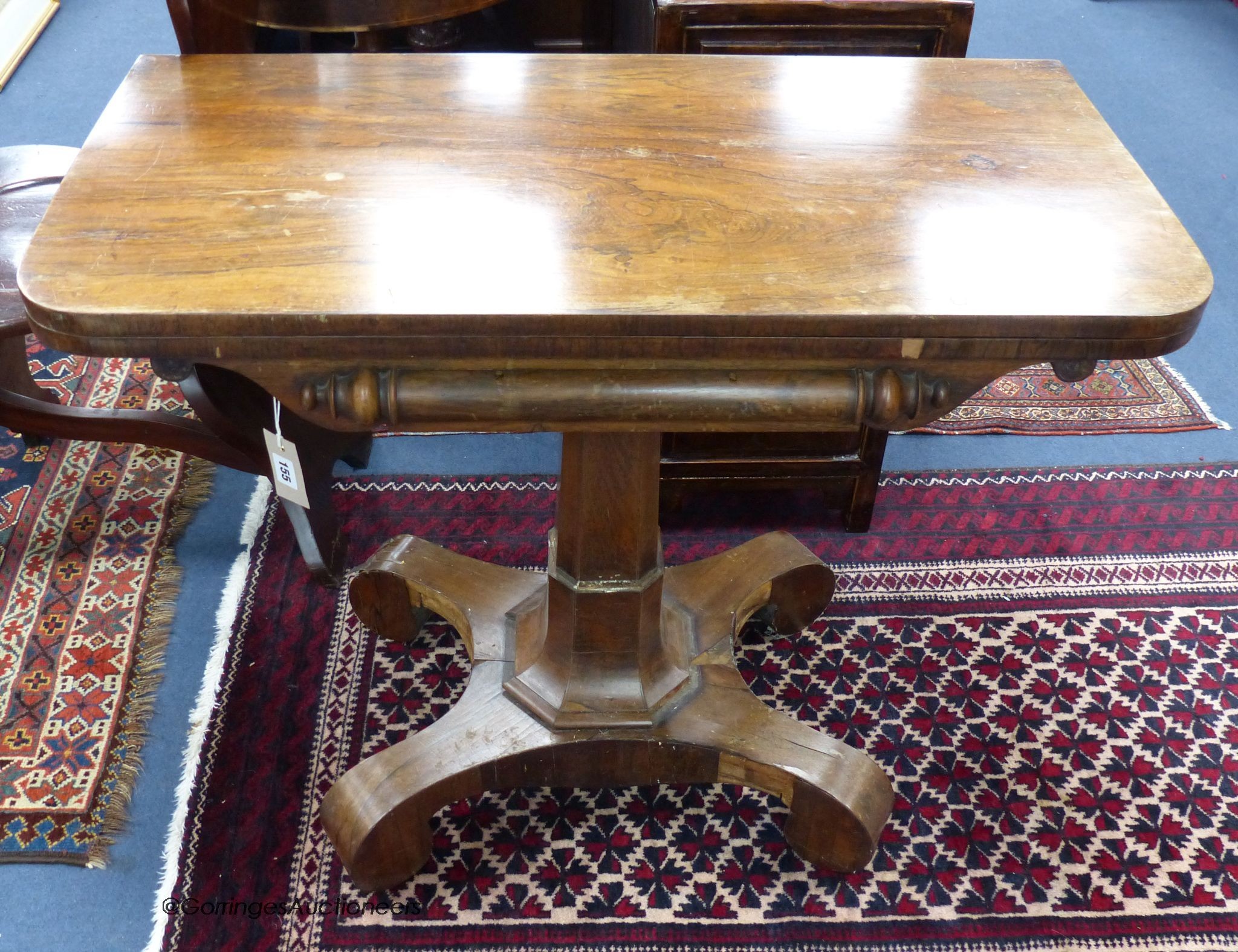 An early Victorian rosewood veneered folding card table, width 90cm, depth 45cm, height 74cm