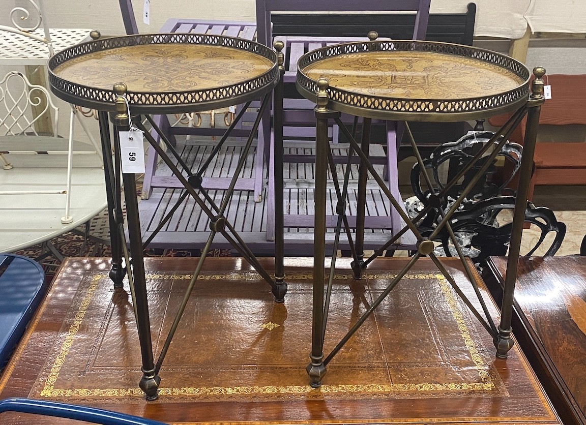 A pair of Maison Jansen style circular faux leather top brass galleried occasional tables, diameter 43cm, height 59cm