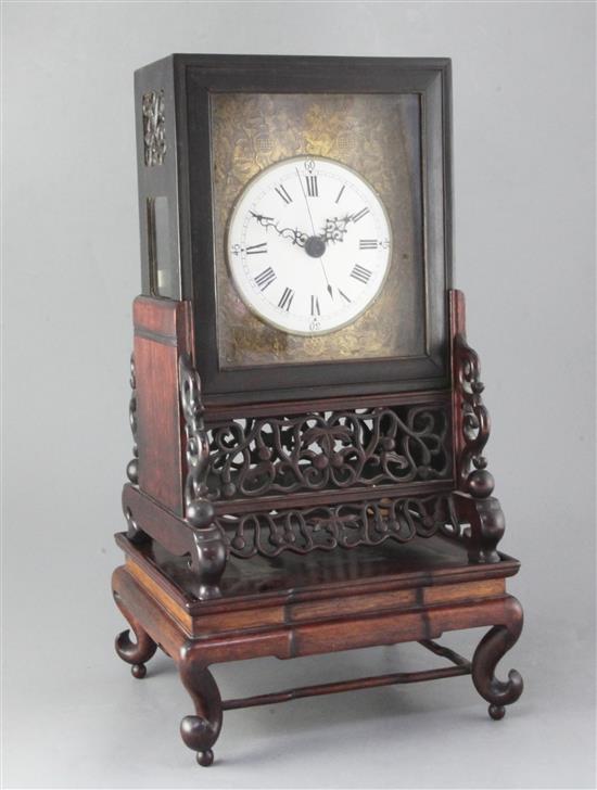 A 19th century Chinese hardwood mantel clock, 20in. A 19th century Chinese hardwood mantel clock, 20in.