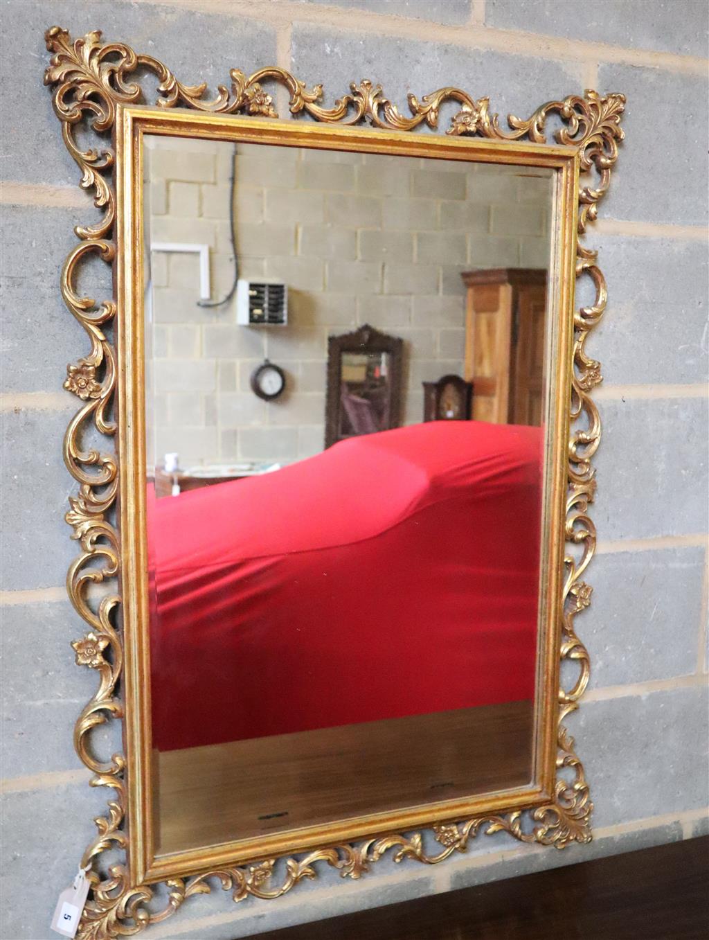 A rectangular gilt frame wall mirror, width 75cm, height 110cm
