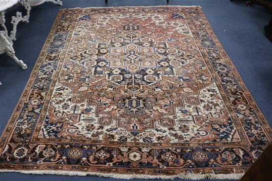 A Persian Kashan cream ground carpet 294 x 234cm A Persian Kashan cream ground carpet 294 x 234cm