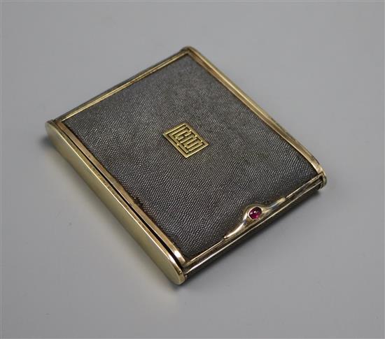A shagreen and gilt metal cigarette case by Cartier, A shagreen and gilt metal cigarette case by Cartier,