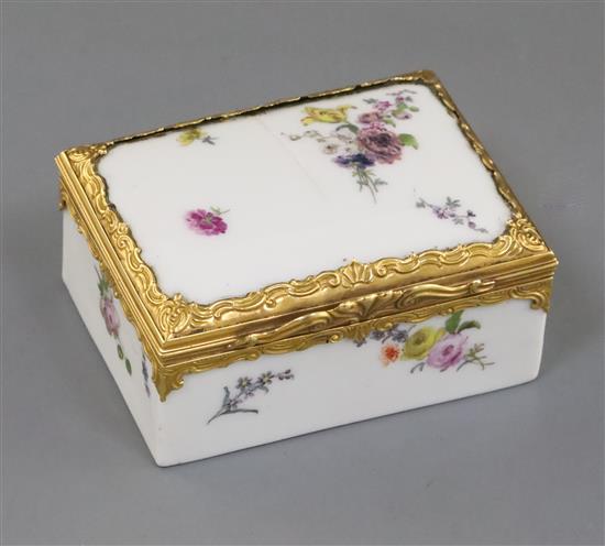 A Meissen gold mounted table snuff box, mid 18th century, W. 6.8cm, lid cracked A Meissen gold mounted table snuff box, mid 18th century, W. 6.8cm, lid cracked