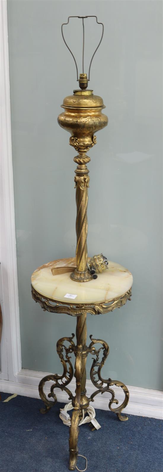 A brass and onyx standard lamp W.40cm A brass and onyx standard lamp W.40cm