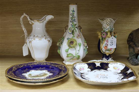 A collection of Coalport including two flower encrusted vases and a ewer A collection of Coalport including two flower encrusted vases and a ewer