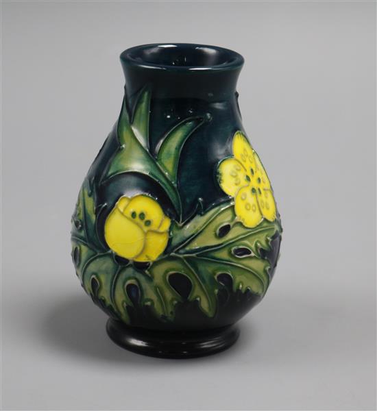 A small Moorcroft vase A small Moorcroft vase