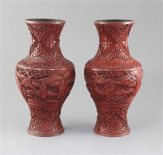 A pair of Chinese cinnabar lacquer baluster vases, 19th century, height 25.5cm A pair of Chinese cinnabar lacquer baluster vases, 19th century, height 25.5cm
