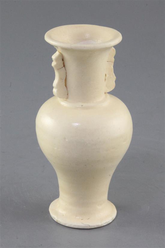 A small Chinese Dehua two handled baluster vase, Song dynasty, height 12.5cm A small Chinese Dehua two handled baluster vase, Song dynasty, height 12.5cm