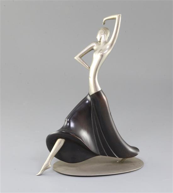 Franz Hagenauer. An Art Deco plated brass and ebonised wood figure of Josephine Baker, 12in. Franz Hagenauer. An Art Deco plated brass and ebonised wood figure of Josephine Baker, 12in.