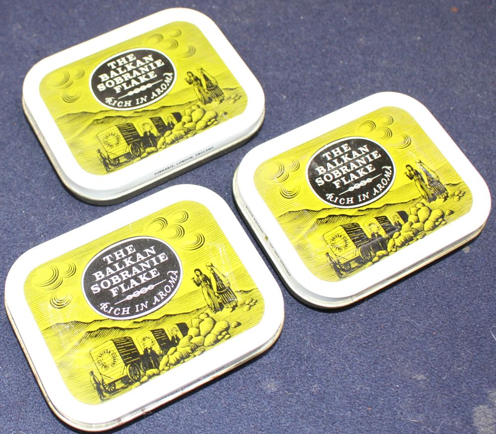 A collection of twenty one 20th century Balkan Sobranie Flake tobacco tins.