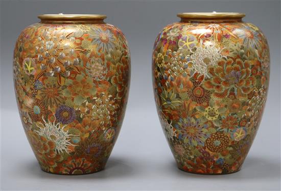 A pair of early 20th century Japanese Satsuma pottery vases H.18cm A pair of early 20th century Japanese Satsuma pottery vases H.18cm