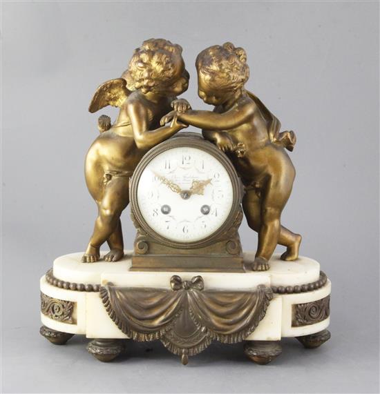 An early 20th century French ormolu mounted marble mantel clock, retailed by Charles Frodsham, height 12.25in.