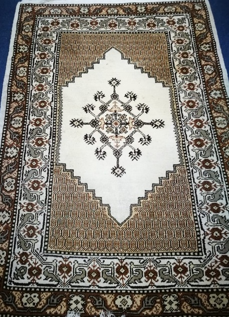 A modern Eastern rug, woven with two rows of botehs 215 x 146cm A modern Eastern rug, woven with two rows of botehs 215 x 146cm