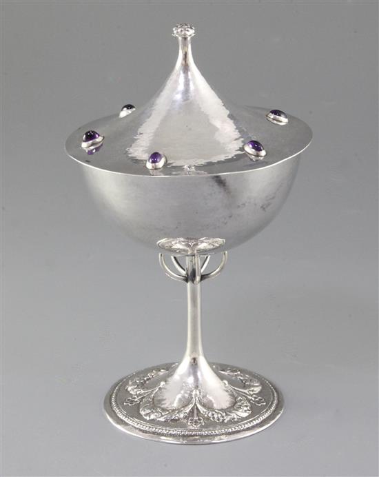 A good Edwardian Arts & Crafts gem set silver cup and cover, by Guild of Handicrafts Ltd, possibly from a design by C.R. Ashbee, A good Edwardian Arts & Crafts gem set silver cup and cover, by Guild of Handicrafts Ltd, possibly from a design by C.R. Ashbee,