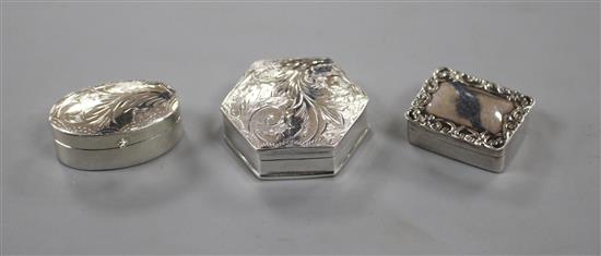 Three assorted modern silver pill boxes, including engraved hexagonal and rectangular with scroll border, largest 31mm.