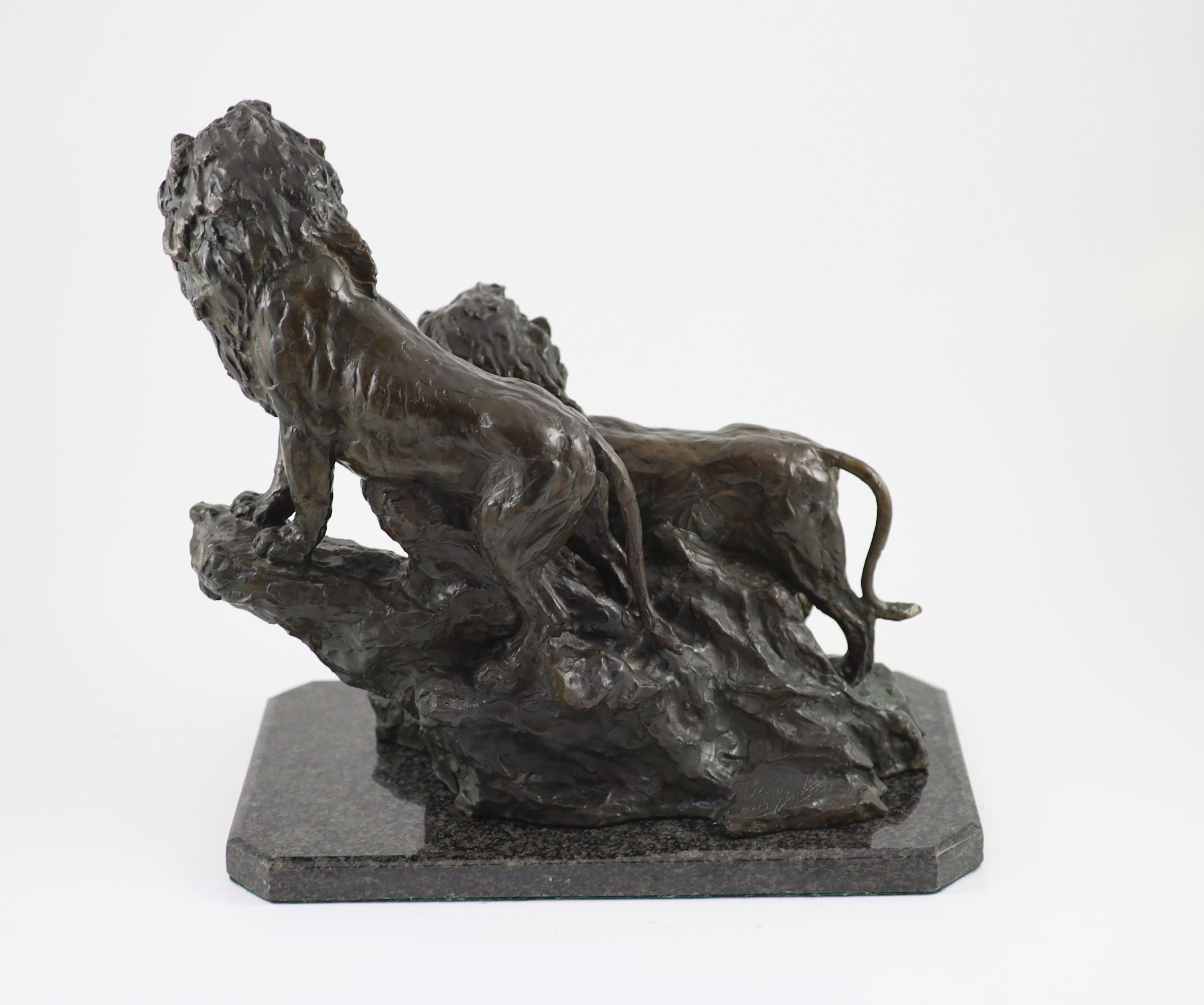 Barry Jackson (SA, 1948-), a bronze group of two lions, H 36cm. W 36cm. D 21cm.