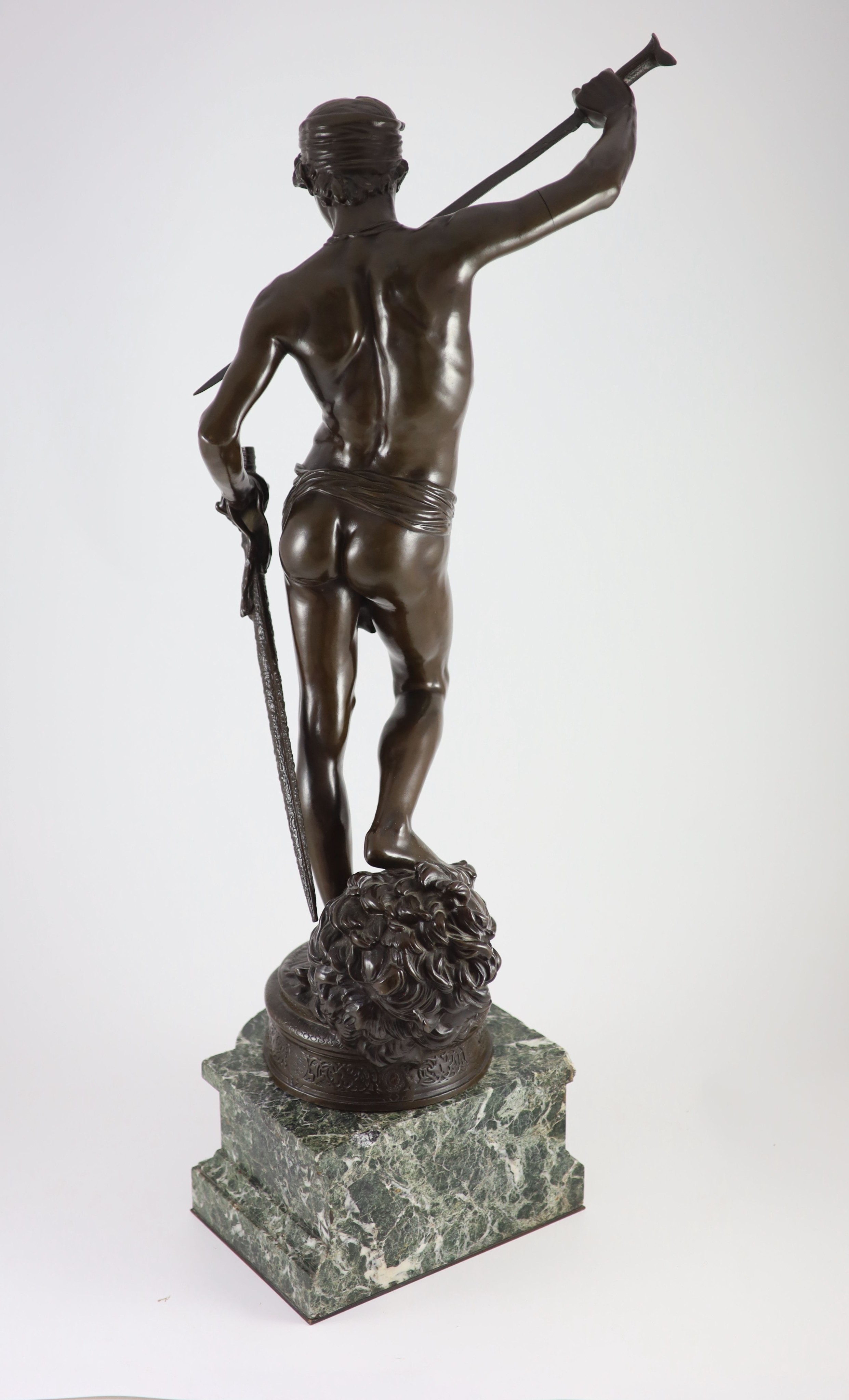 Antonin Mercié (1845-1916). A bronze figure of David standing holding a sword height 86.5cm