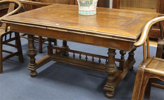 A 17th century style French design walnut extending dining table W.292cm fully extended A 17th century style French design walnut extending dining table W.292cm fully extended