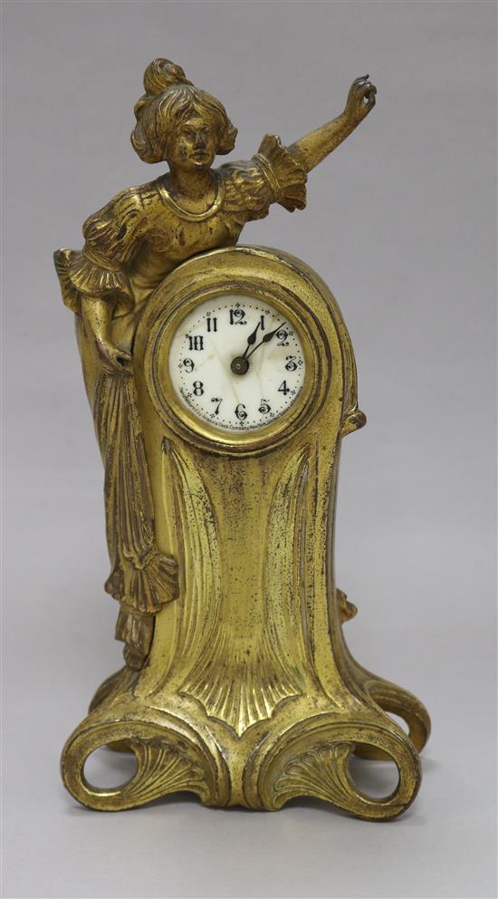 An Art Nouveau gilt clock height 26cm An Art Nouveau gilt clock height 26cm