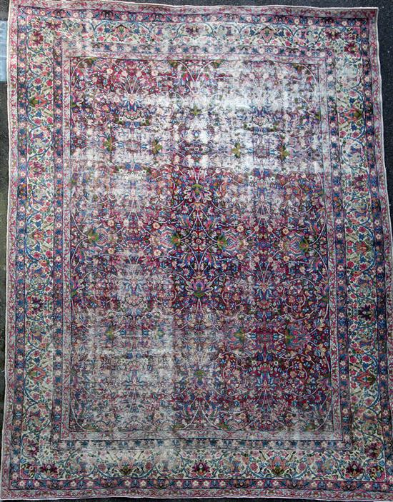 A Kirman ivory ground carpet, A Kirman ivory ground carpet,