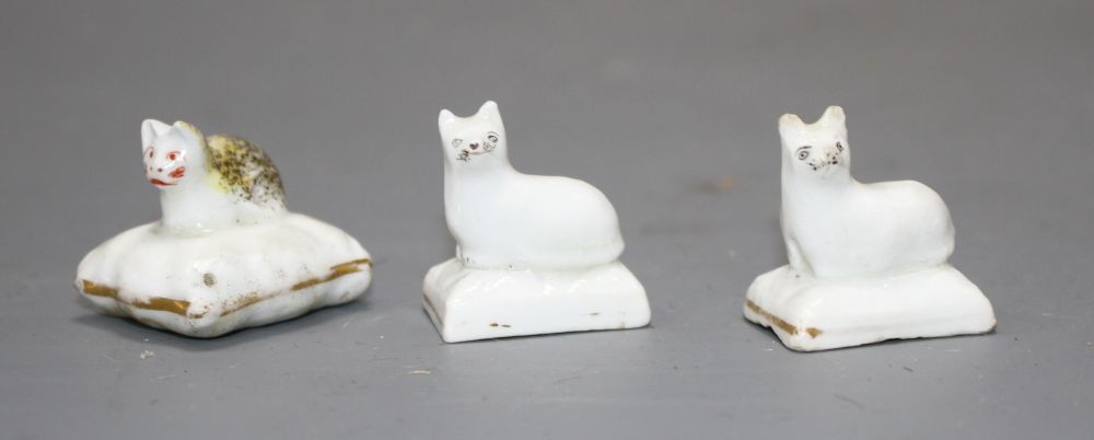 Three Staffordshire porcelain miniature models of recumbent kittens, c.1835-50, L. 2.6 - 3.2cm
