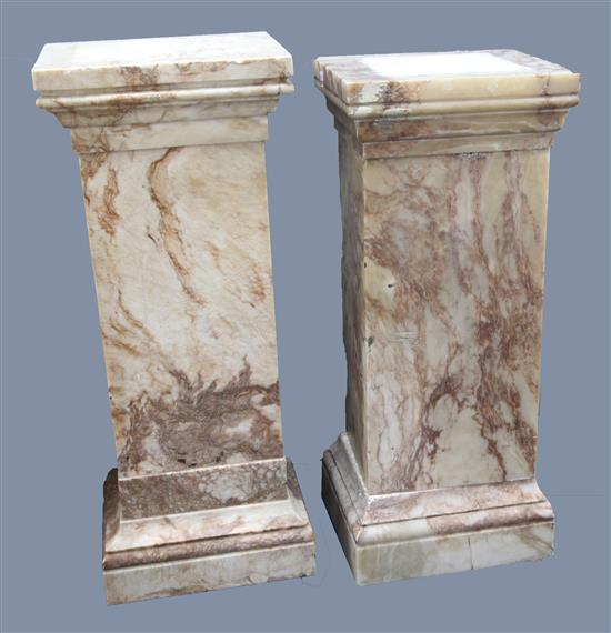 A near pair of square section pink veined marble pedestals, W.1ft 6in. D.1ft 4in. H.3ft 8in. A near pair of square section pink veined marble pedestals, W.1ft 6in. D.1ft 4in. H.3ft 8in.