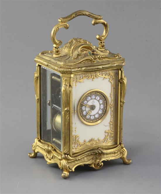An early 20th century ormolu hour repeating carriage clock, 5.5in. An early 20th century ormolu hour repeating carriage clock, 5.5in.