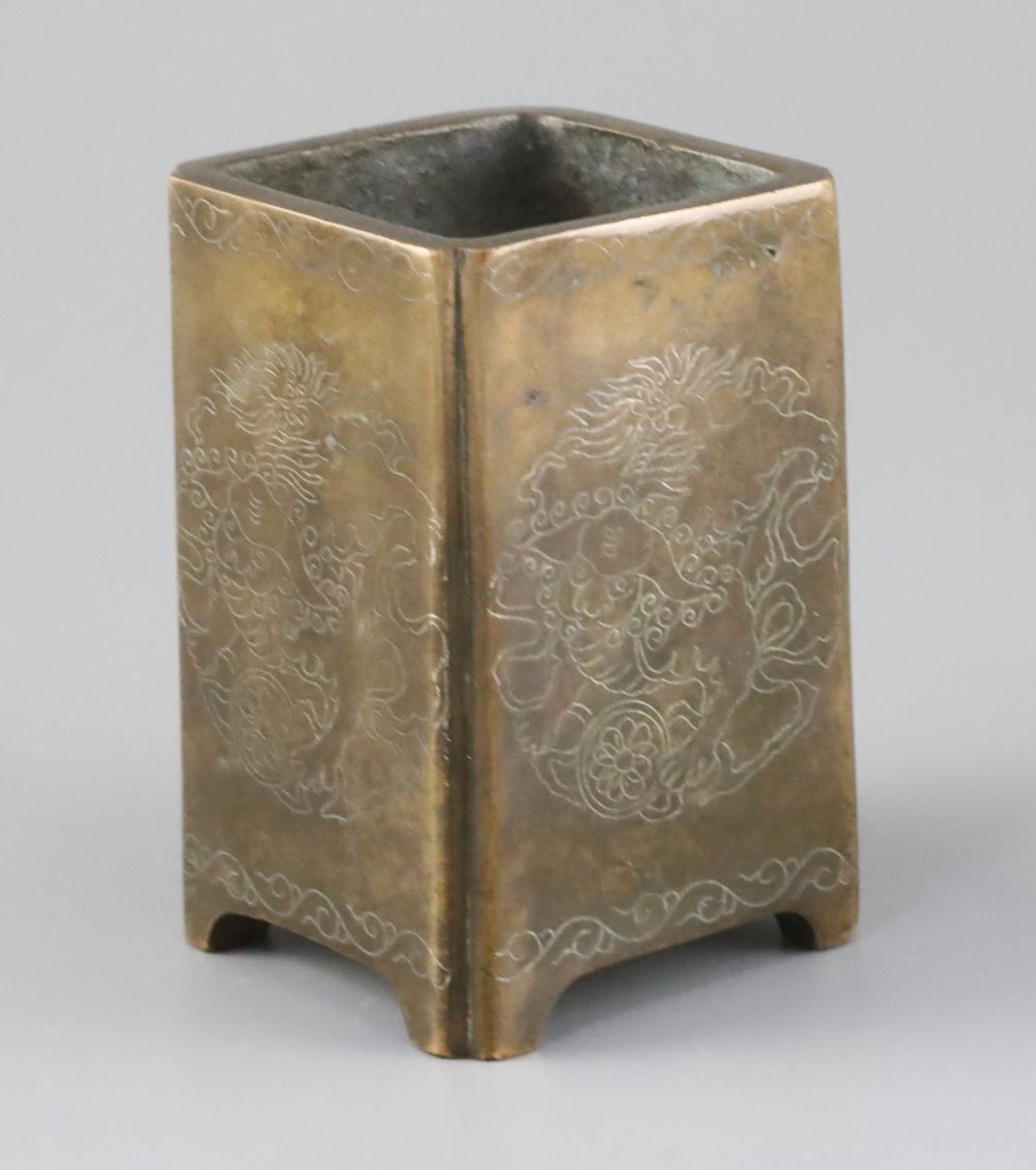 A Chinese bronze and silver inlaid square brush pot,