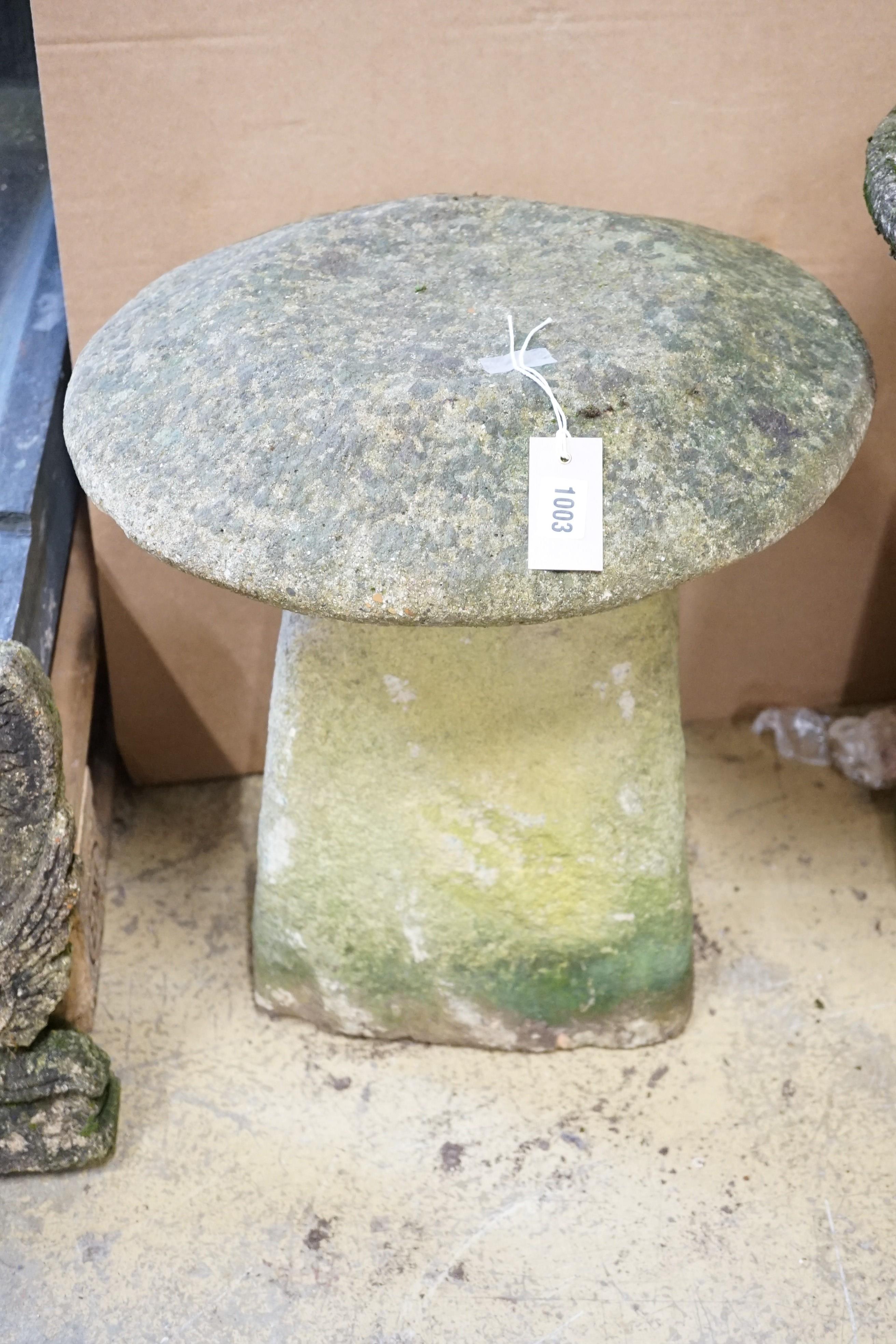 A carved and reconstituted staddle stone, height 50cm, diameter 46cm