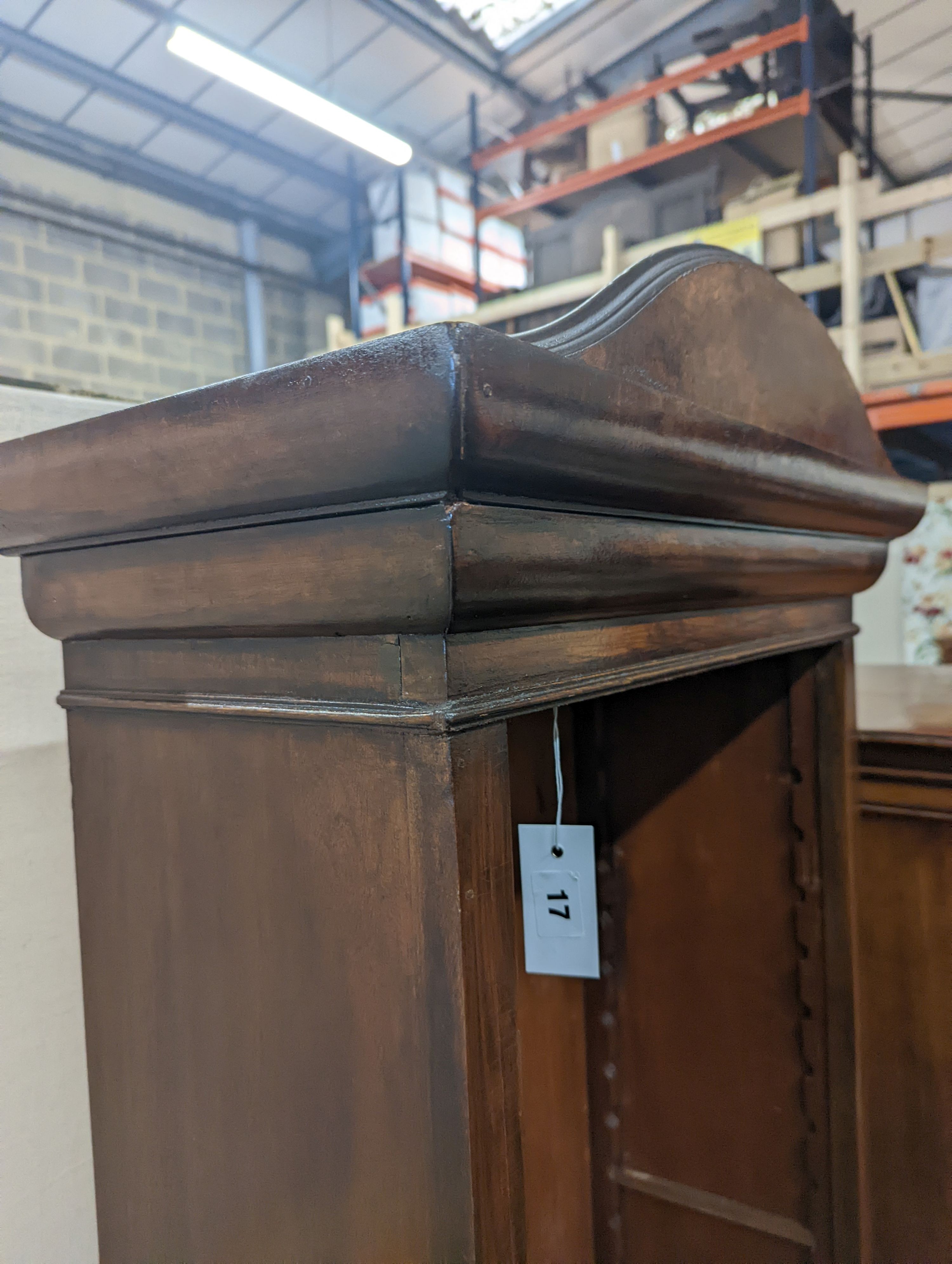 A George II style narrow walnut open bookcase, width 65cm, depth 30cm, height 184cm