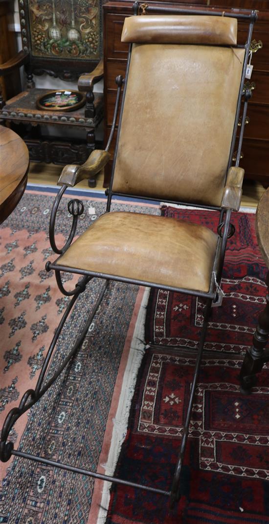 A metal framed rocking chair A metal framed rocking chair