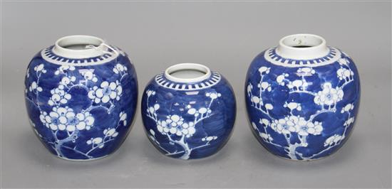 Three Chinese blue and white prunus jars, early 20th century, H. 9 -12.5cm