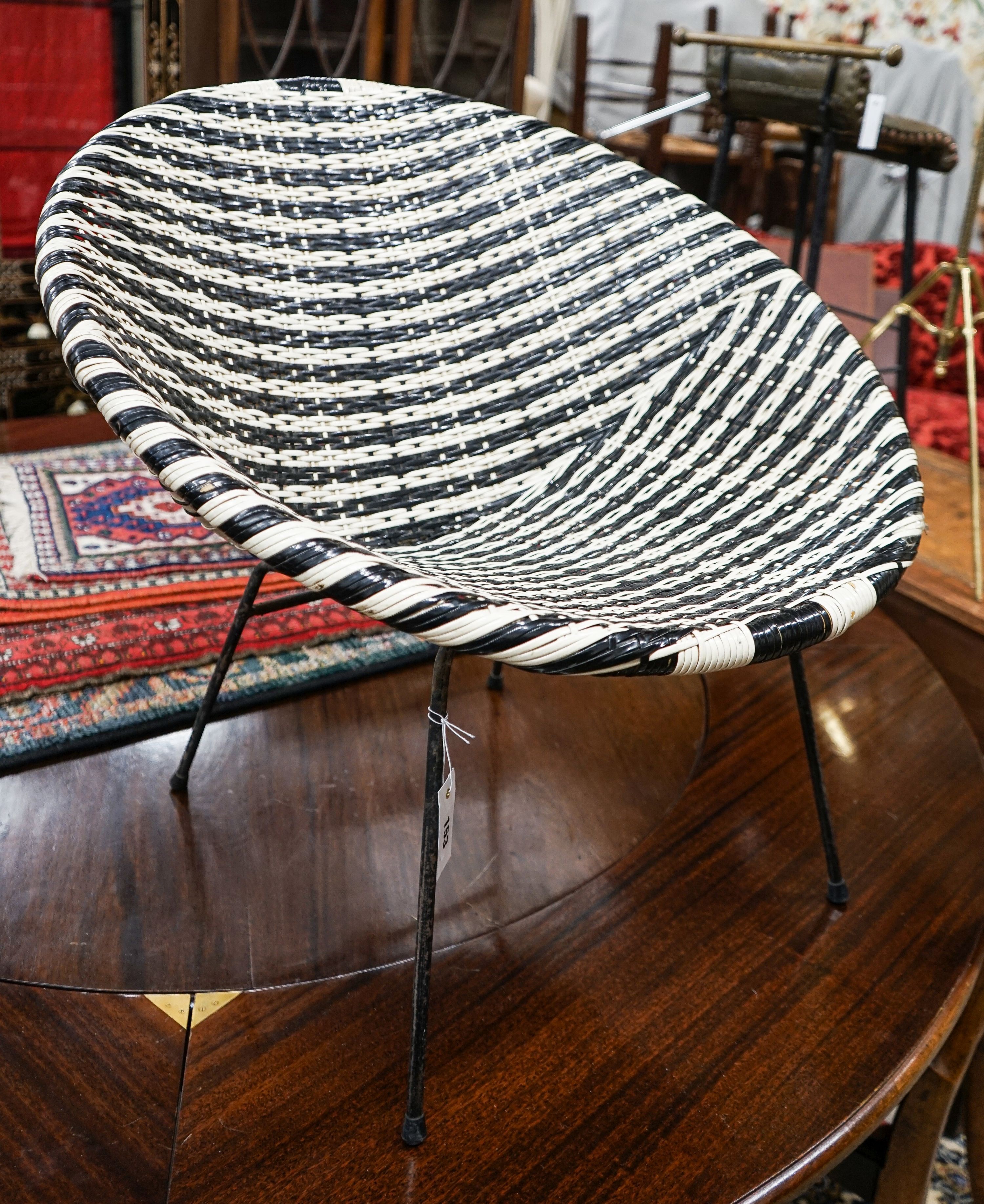 A 1960's woven chair, width 68cm, depth 48cm, height 64cm