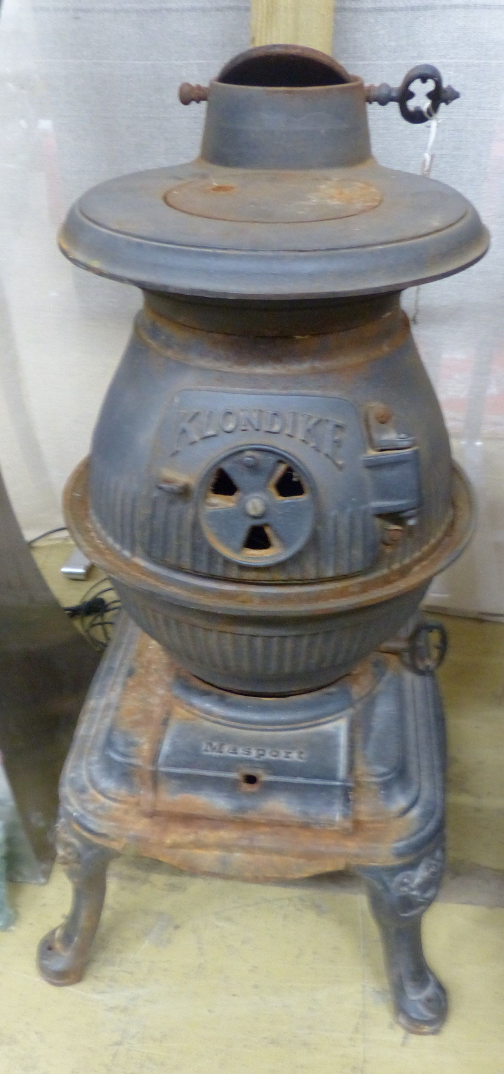 A Klondike cast iron stove, H.76cm