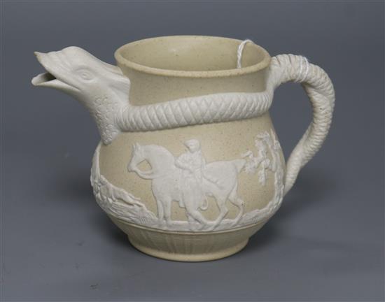 A 19th century yellow ground jug with snake handle height 8cm A 19th century yellow ground jug with snake handle height 8cm