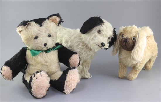 Two dogs English 1930s, one large cat 1950s, tallest 15in. Two dogs English 1930s, one large cat 1950s, tallest 15in.