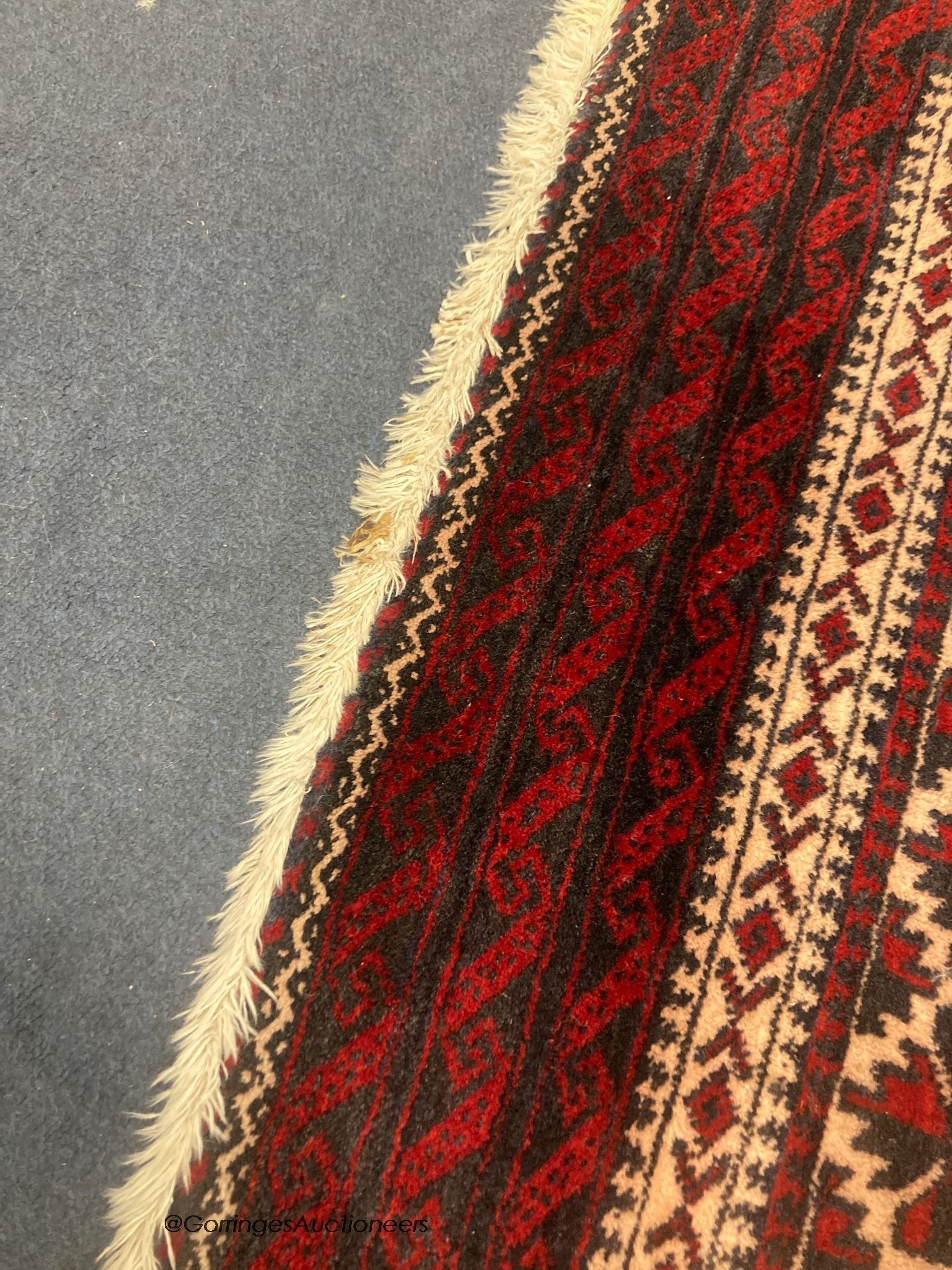 A Belouch wool rug, 194 x 105cm