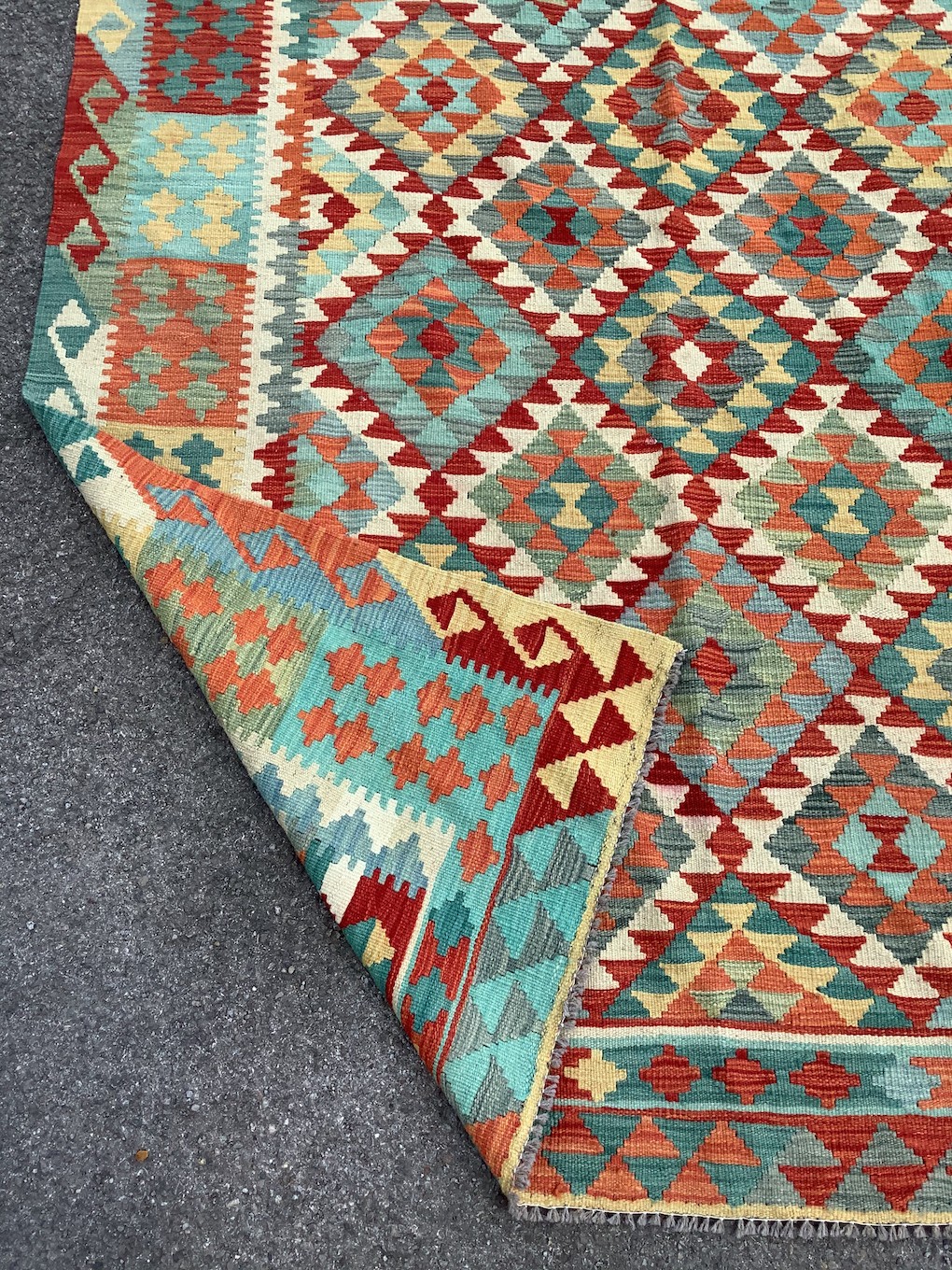 An Anatolian style polychrome Kilim flatweave carpet, 254 x 185cm