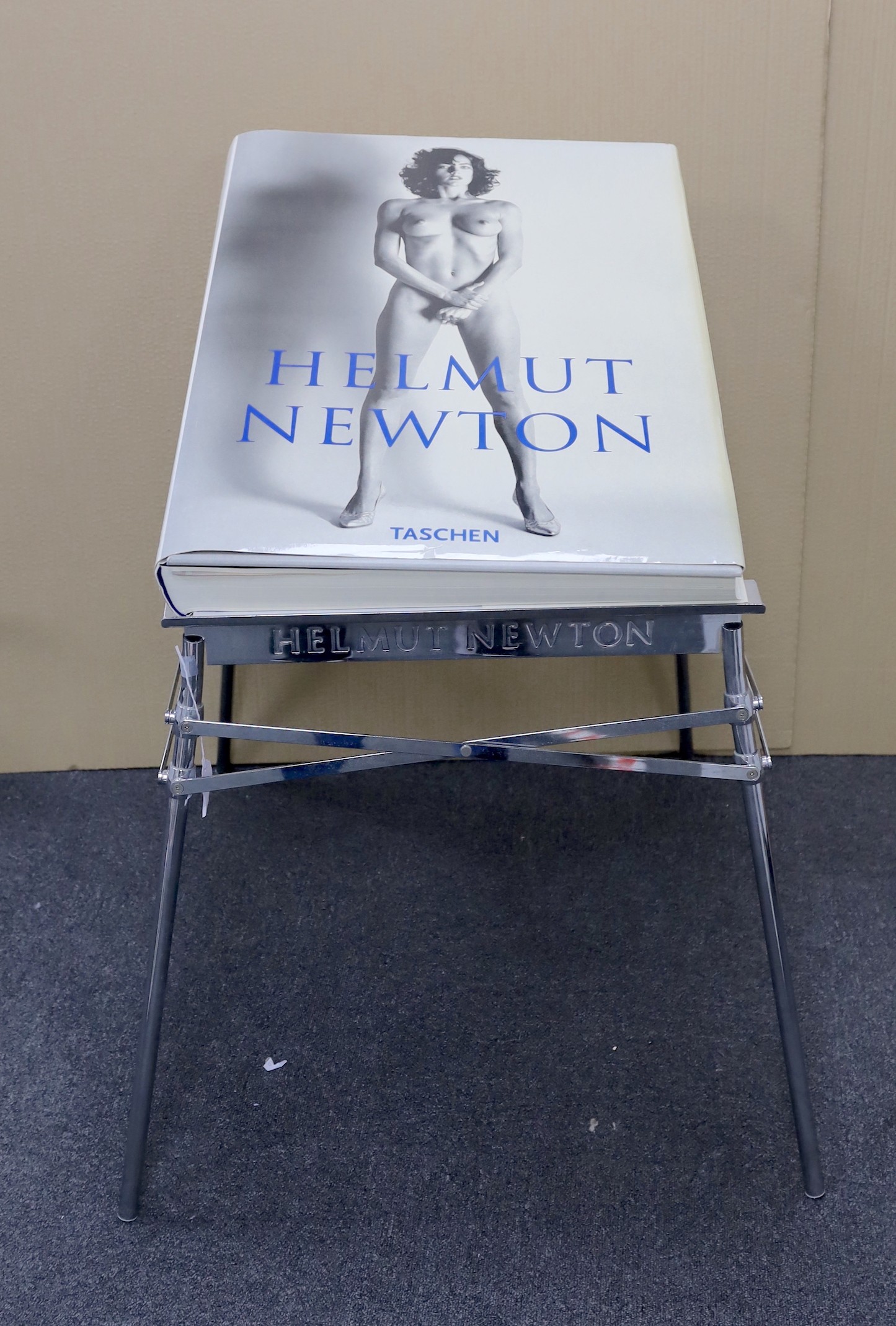 Newton, Helmut - Sumo, one of 10,000, signed, folio, original cloth in d/j, with 464 pp., 400 plates, Taschen, Monte Carlo, 1999, with chrome stand designed by Philippe Starck, together with original shipping box.