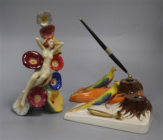 A Carlton ware figure The Carlton Girl Hollyhocks and two lustre pen stands figure height 22cm A Carlton ware figure The Carlton Girl Hollyhocks and two lustre pen stands figure height 22cm