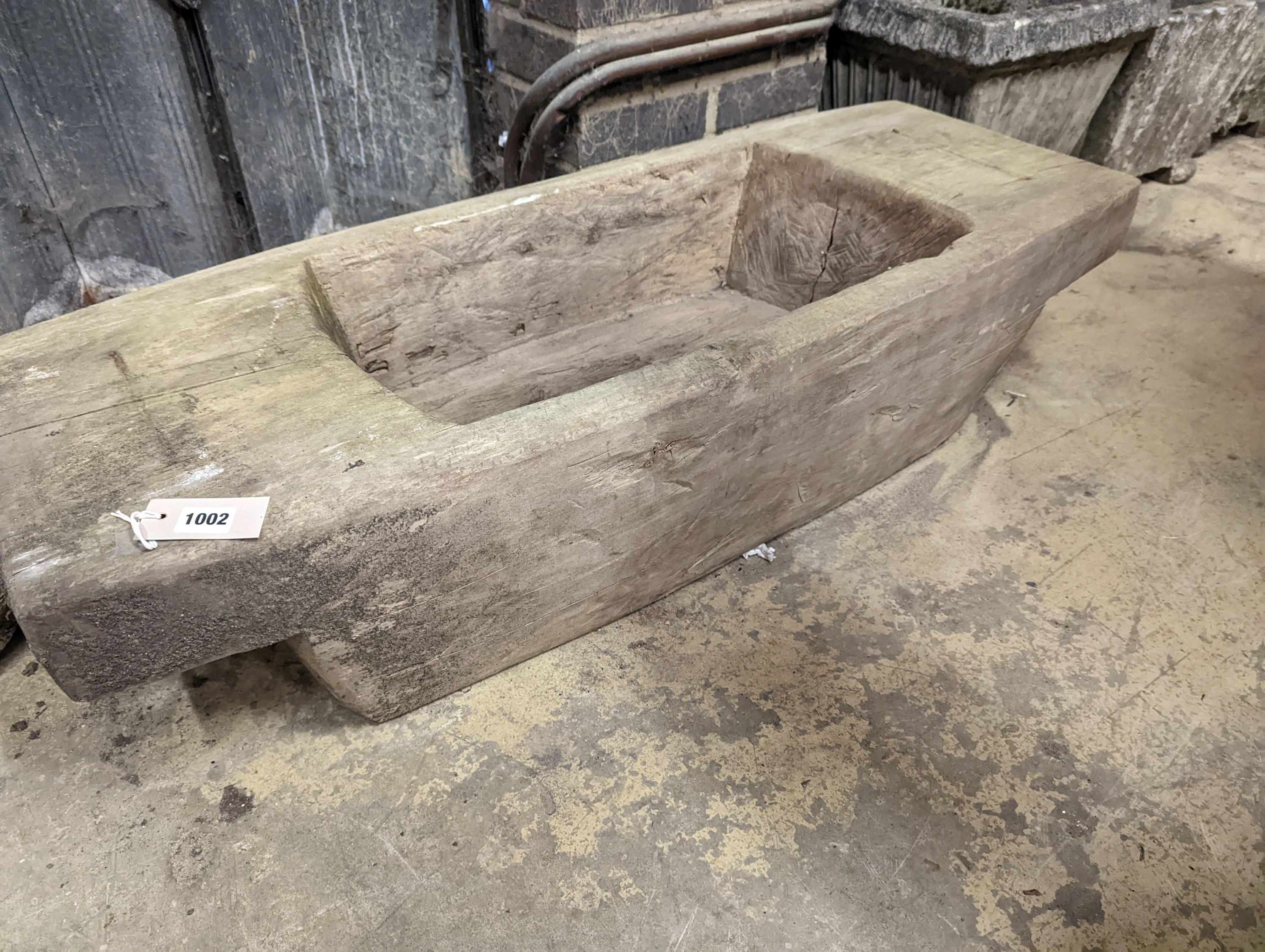 A Continental carved wood trough, width 112cm, depth 44cm