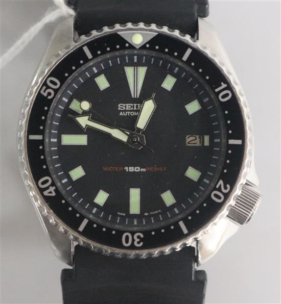 A Seiko Scuba 150 gentlemans stainless steel wristwatch, with date aperture, on black rubber strap