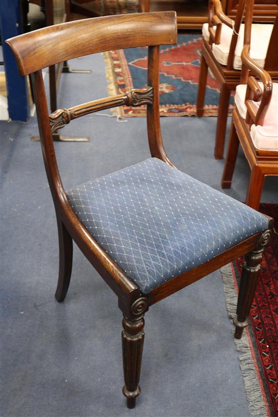 A set of eight rosewood dining chairs A set of eight rosewood dining chairs