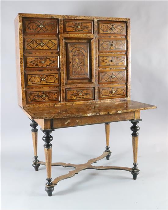 A Louis XIV inlaid walnut cabinet on stand, W.3ft 11in. D.2ft 9in. H.5ft 5in. A Louis XIV inlaid walnut cabinet on stand, W.3ft 11in. D.2ft 9in. H.5ft 5in.