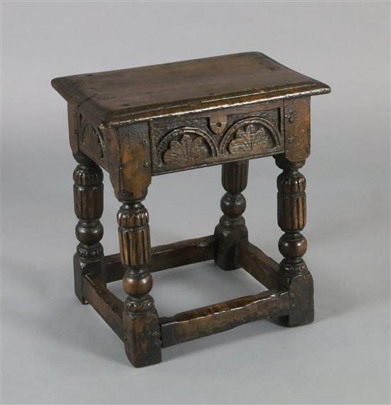 An oak joined stool, W.1ft 8in. D.1ft H.1ft 10in. An oak joined stool, W.1ft 8in. D.1ft H.1ft 10in.