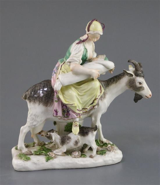 A Meissen group of the Tailors wife, c.1750, height 17.5cm, some losses A Meissen group of the Tailors wife, c.1750, height 17.5cm, some losses