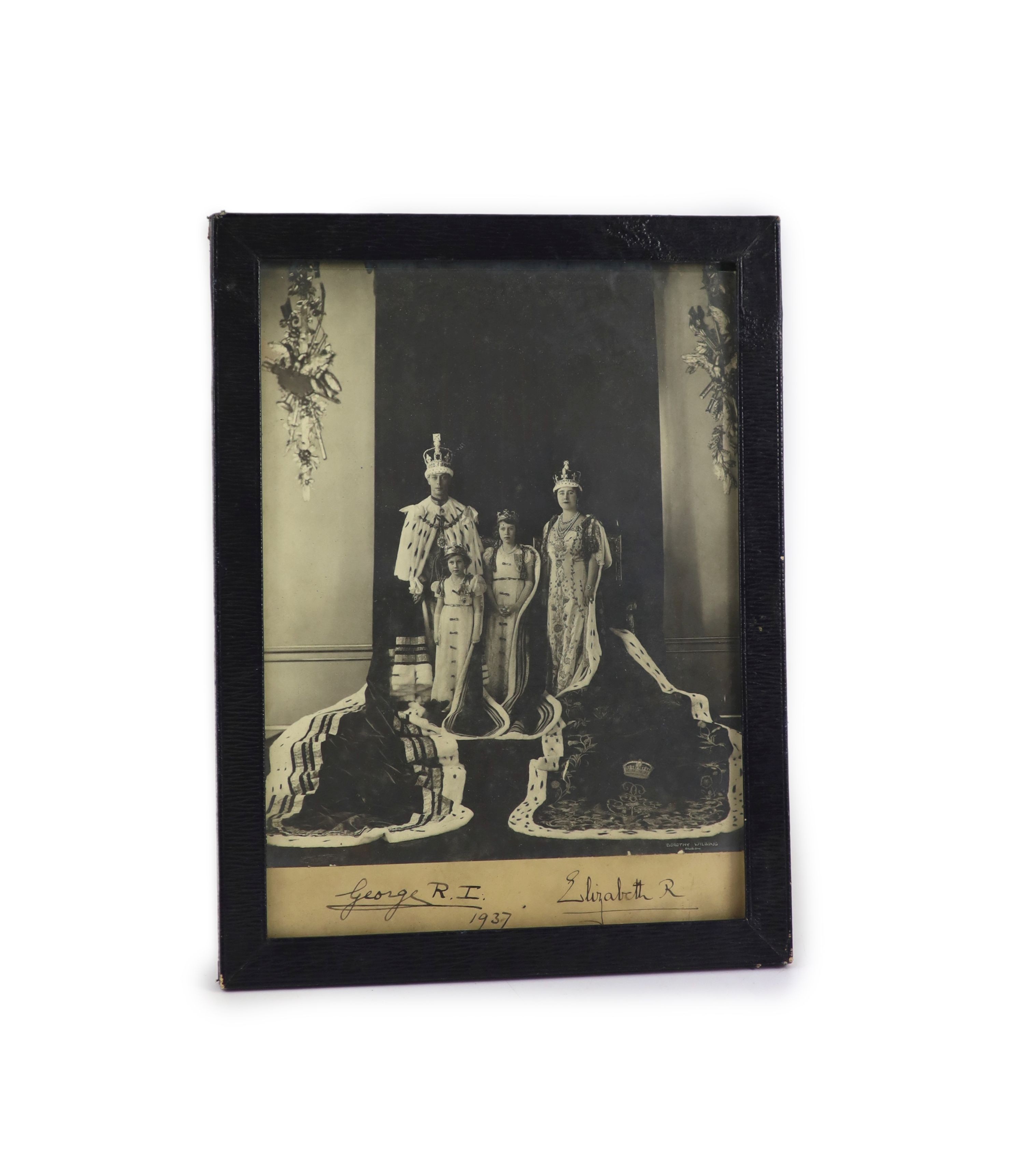 Royal Interest - a signed photograph of George VI, Queen Elizabeth and Princesses Elizabeth and Margaret in formal robes, dated 1937, Frame 32 x 24 cm