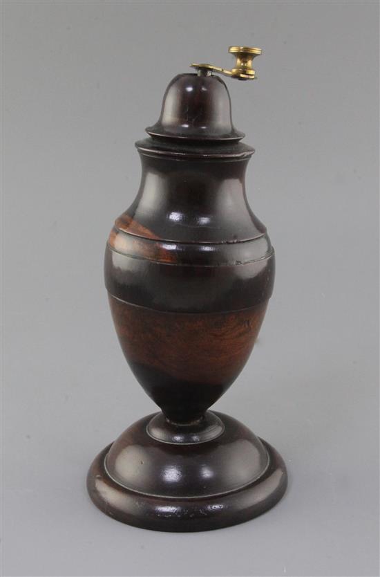 A George III lignum vitae coffee mill, 10in. A George III lignum vitae coffee mill, 10in.