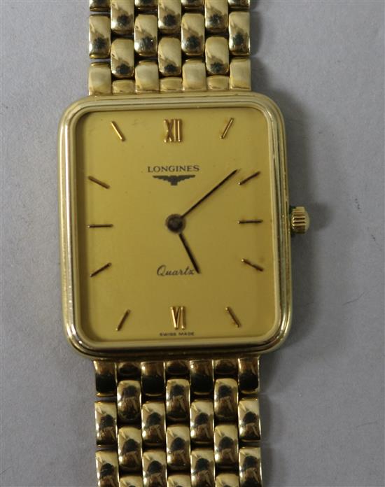 A gentlemans 9ct gold Longines Quartz wrist watch, on a 9ct Longines bracelet, with boxes. A gentlemans 9ct gold Longines Quartz wrist watch, on a 9ct Longines bracelet, with boxes.